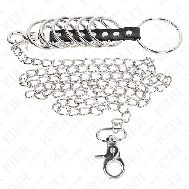 KINK - 7 ANNEAUX PÉNIS EN MÉTAL DE 3,8 CM À 5 CM CONNECTÉS AVEC DU SIMILICUIR ET UNE CHAÎNE EN MÉTAL 100 CM